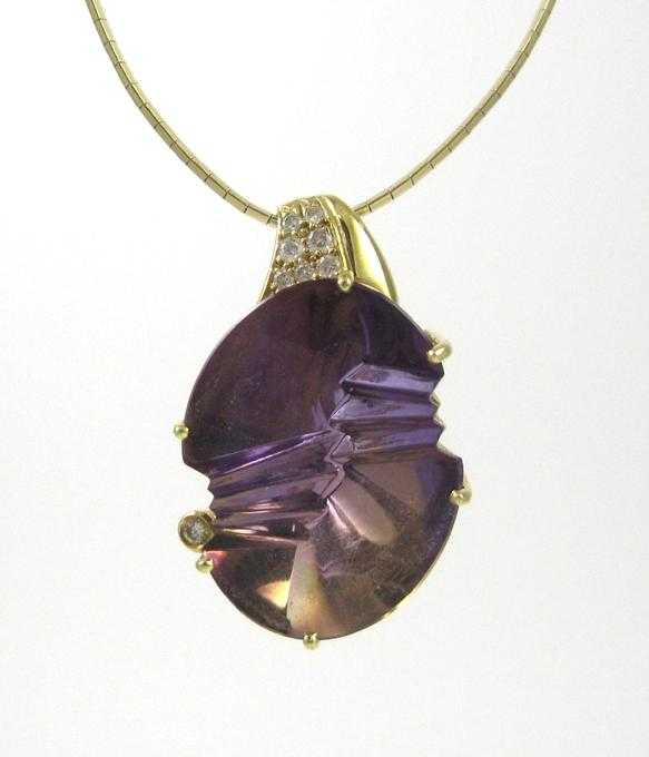 Appraisal: AMETRINE AND DIAMOND PENDANT NECKLACE suspended on a k yellow