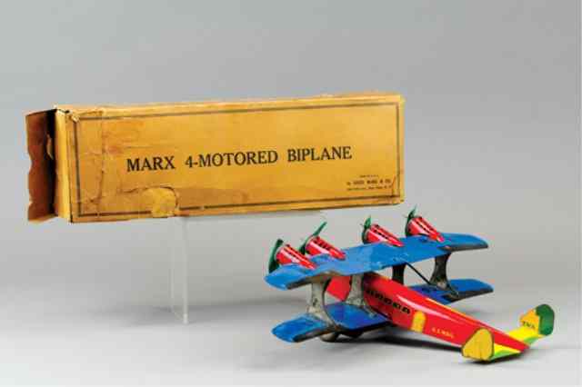 Appraisal: MARX -MOTORED BI-PLANE Includes box lithographed tin done in blue