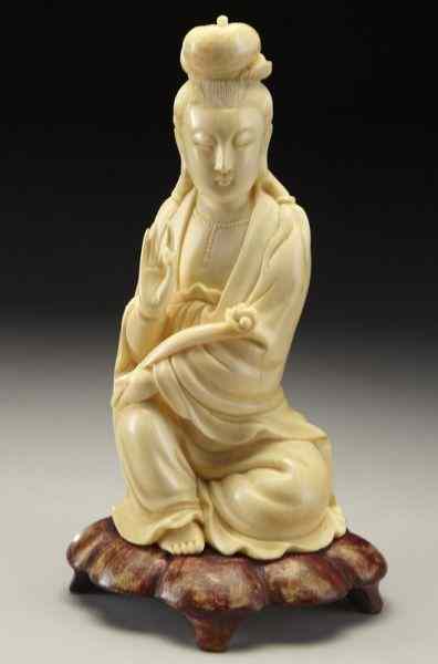 Appraisal: Chinese Qing carved ivory Guanyin one hand International buyers should