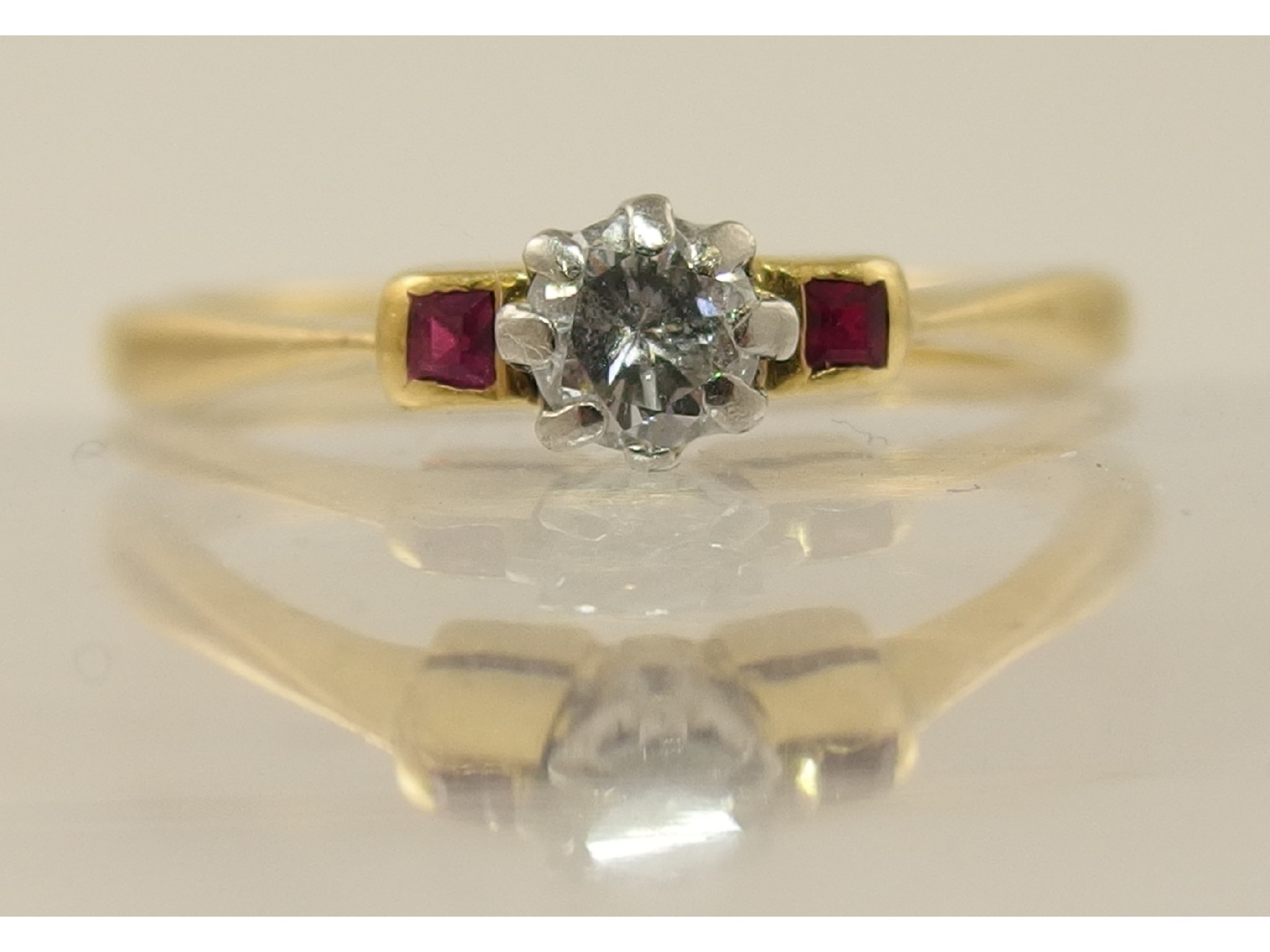 Appraisal: An ct diamond and red gem stone ring