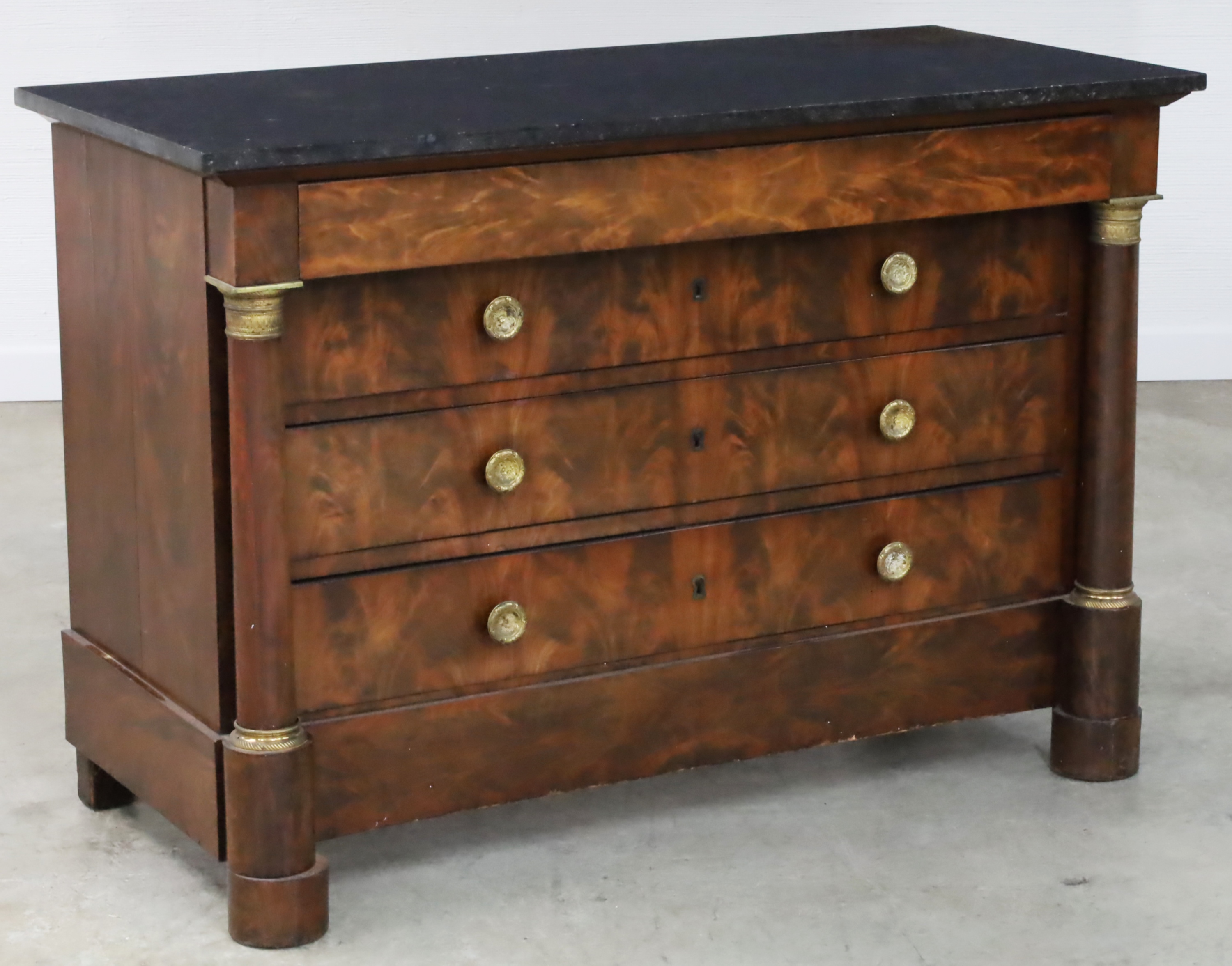 Appraisal: FRENCH EMPIRE MAHOGANY MARBLE TOP COMMODE French Empire crotch mahogany