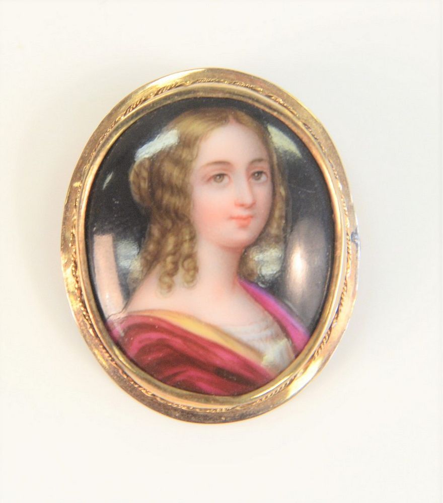 Appraisal: Karat Framed Brooch with painting on porcelain of a young