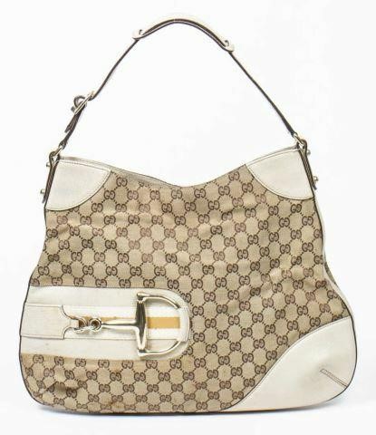 Appraisal: Gucci Hasler hobo bag in GG monogram canvas with gold-tone