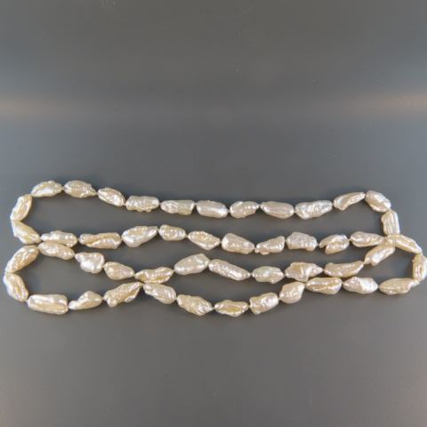 Appraisal: Pearl Necklace elongated baroque pearls fine luster long