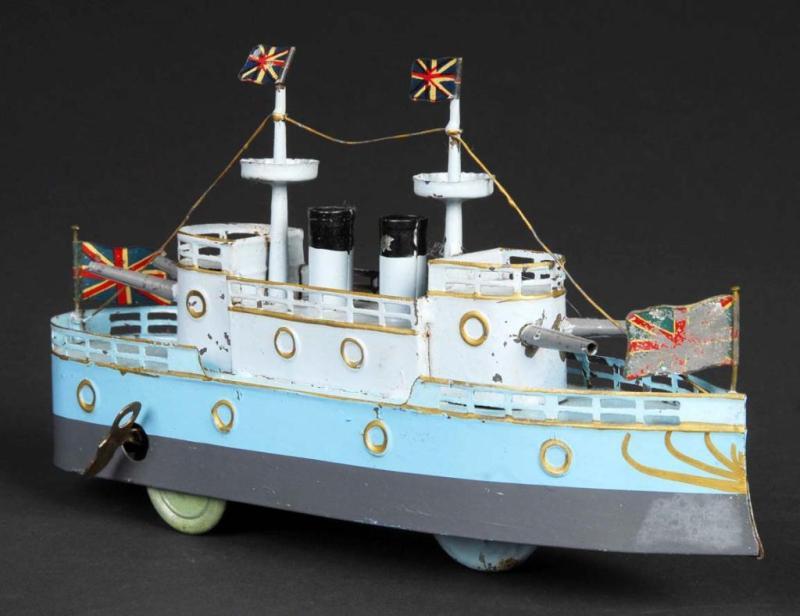 Appraisal: Tin Hand-Painted Battleship Wind-Up Toy Description Japanese Working Includes three