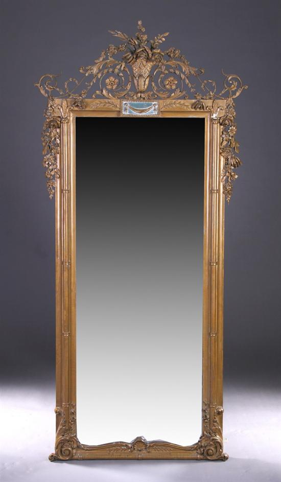 Appraisal: CLASSICAL-STYLE GILTWOOD PIER MIRROR Late th early th century Bouquet-filled