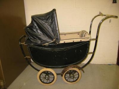 Appraisal: An early th century Marmet doll's pram with black painted