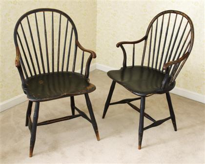 Appraisal: Pair of black painted bowback windsor arm chairs philadelphia pa