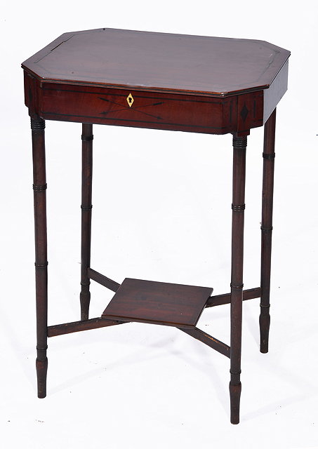 Appraisal: A REGENCY MAHOGANY AND EBONY INLAID WORK TABLE with felt