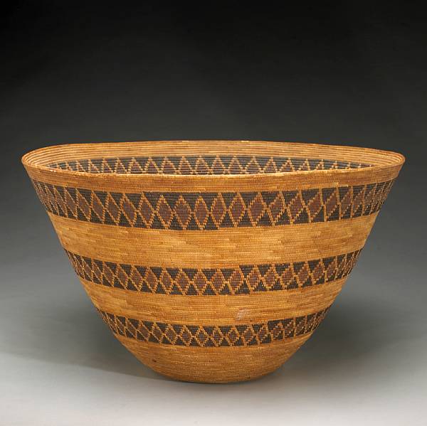 Appraisal: A large Yokut polychrome cooking basket Woven with three graduated