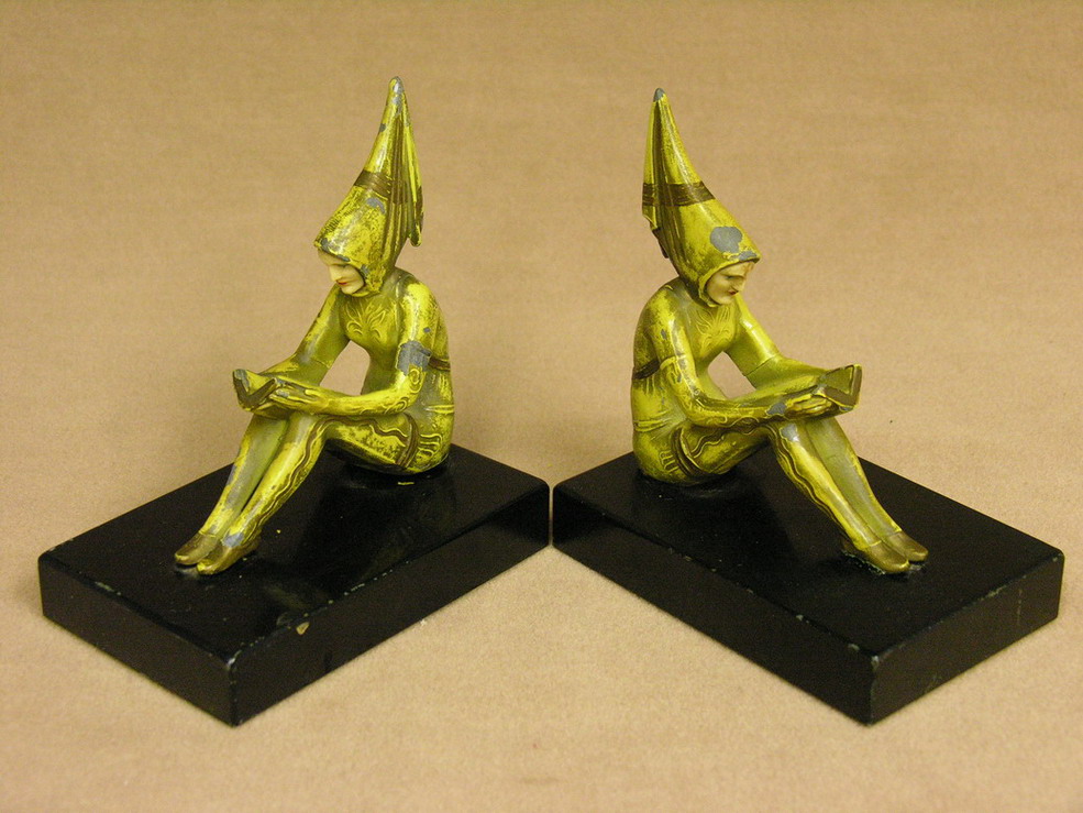 Appraisal: PAIR DECO FIGURAL BOOKENDS Size by Condition Metal figures have