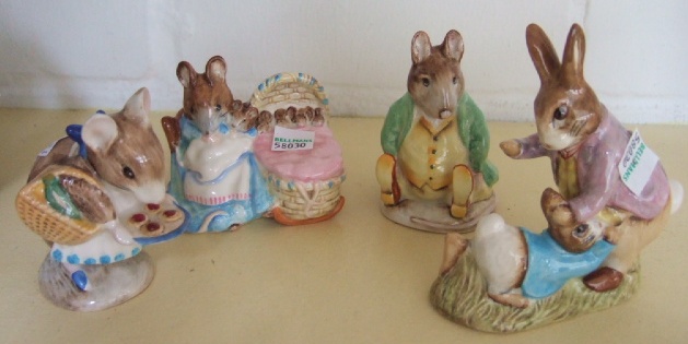 Appraisal: Four Beatrix Potter figures brown back stamp Samuel Whiskers Mr