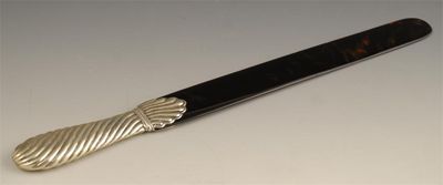 Appraisal: A late Victorian silver handled and tortoiseshell bladed paper knife