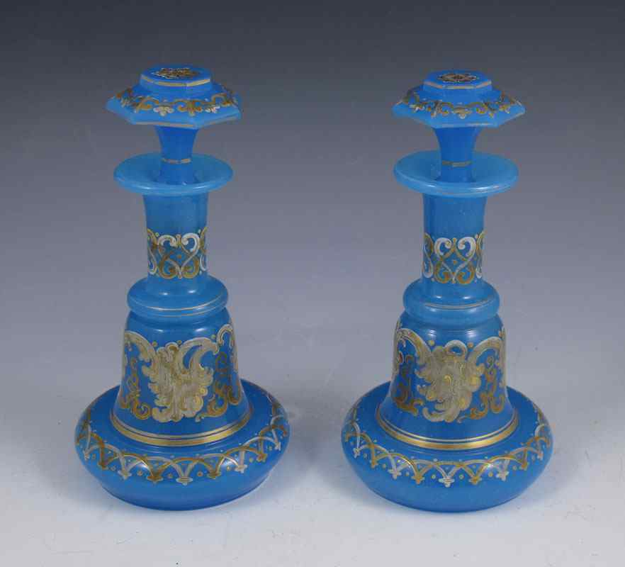 Appraisal: PAIR BLUE OPALINE GLASS PERFUME BOTTLES Hand painted gilding over