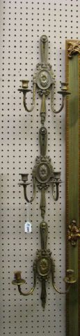 Appraisal: Three brass finish French candle sconces each are inches high