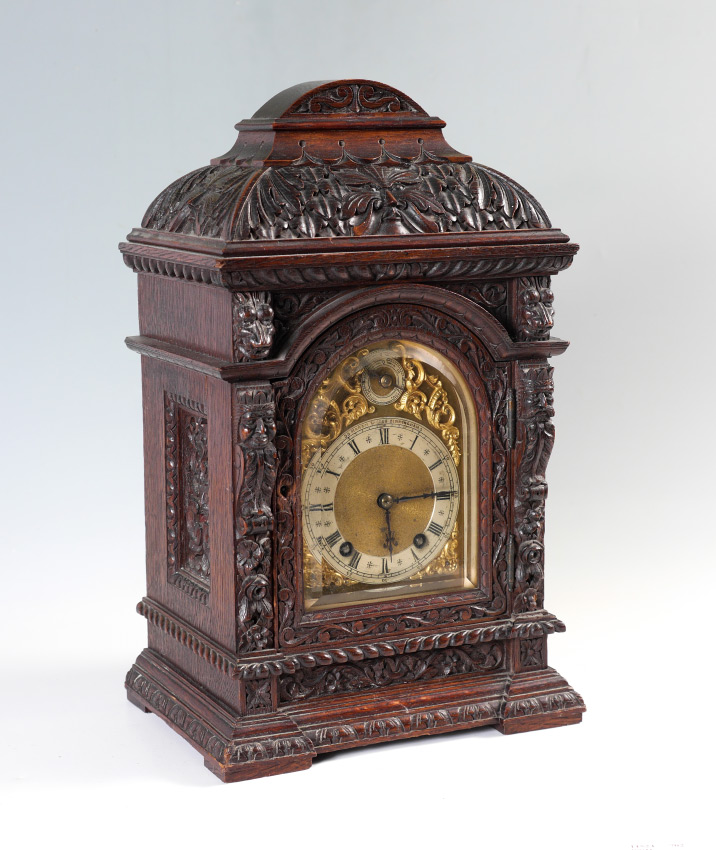 Appraisal: CARVED WINTERHALDER HOFMEIER OAK BRACKET CLOCK Finely carved English oak