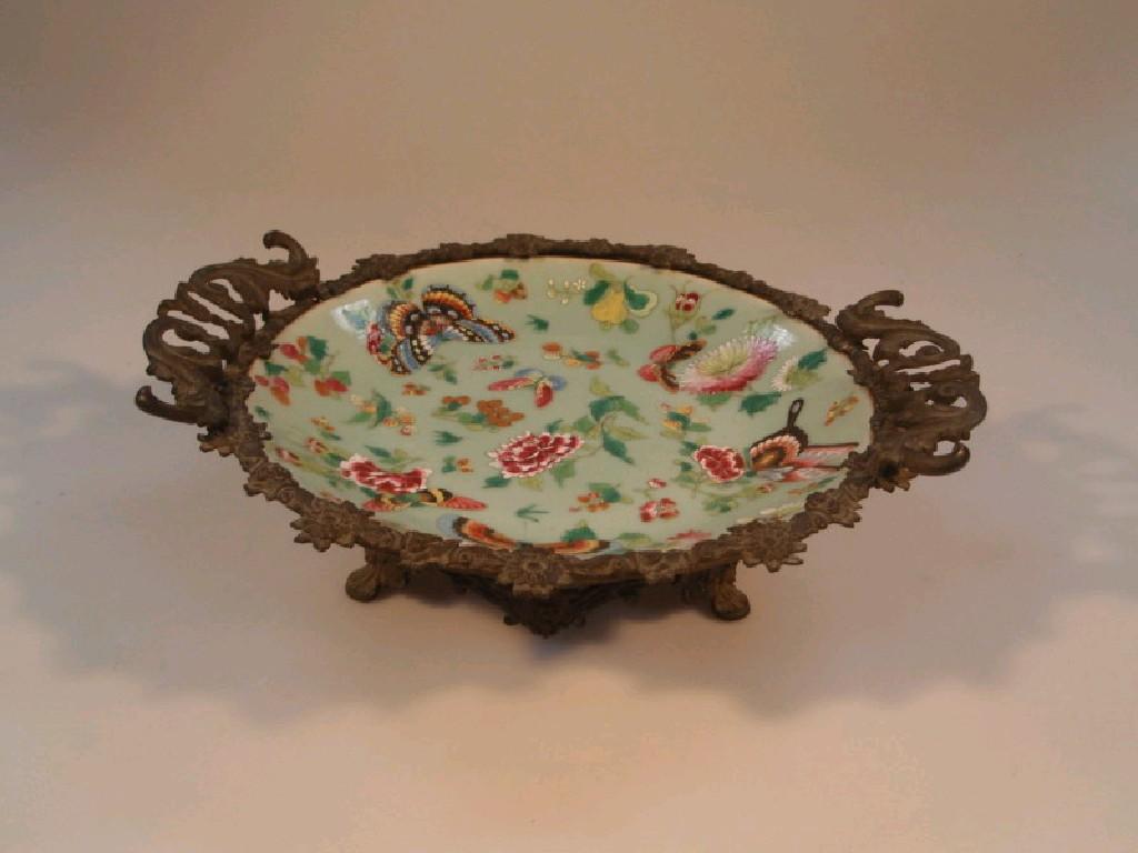 Appraisal: A thC Cantonese enamel dish painted with flowers and butterflies