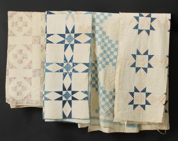 Appraisal: FOUR ANTIQUE QUILTSThe four quilts as shown each hand pieced