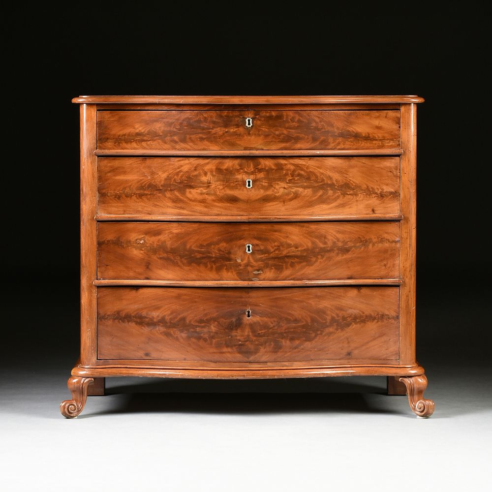 Appraisal: AN AMERICAN ROCOCO REVIVAL FLAME MAHOGANY CHEST OF DRAWERS MID