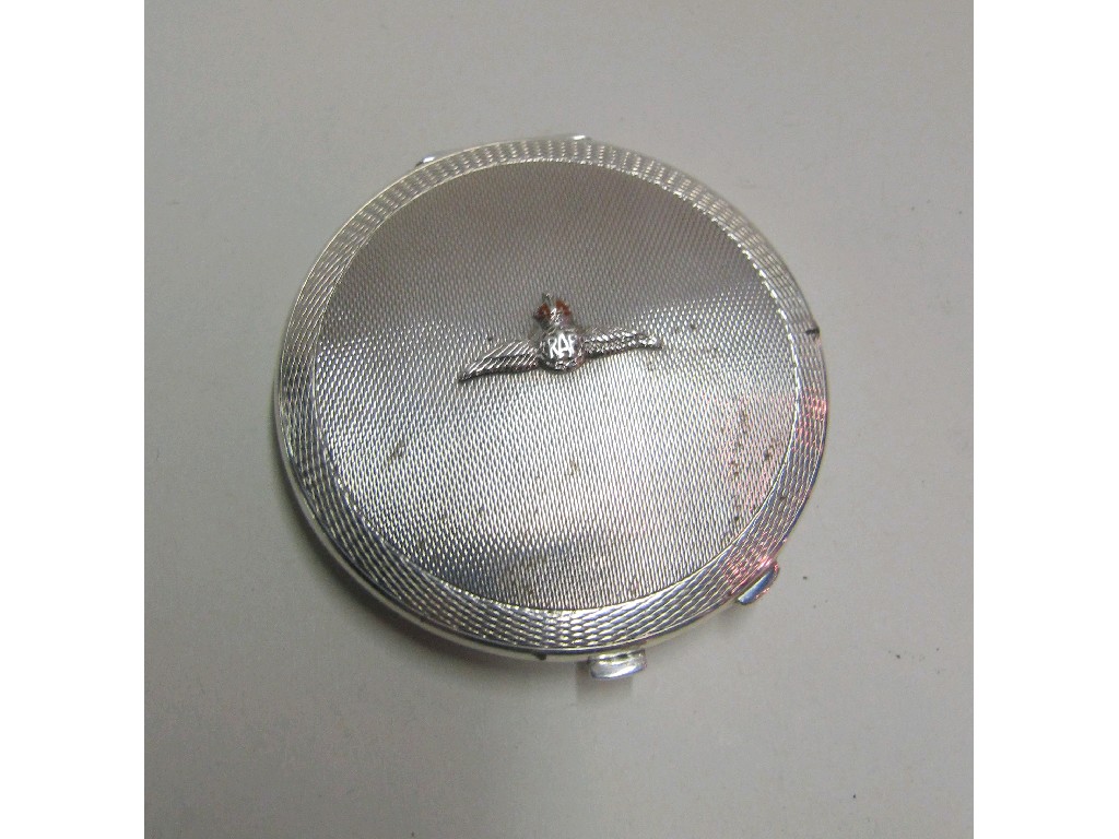 Appraisal: Silver powder compact with winged enamel RAF insignia and engine