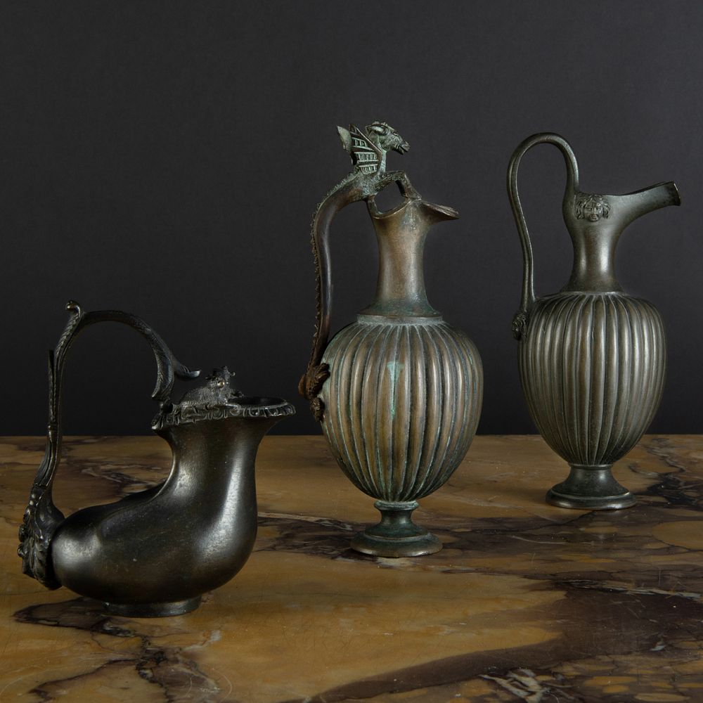 Appraisal: Group of Three Miniature Pompeiian Style Bronze Ewers After the