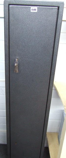 Appraisal: A steel wall mounted gun cabinet cm high