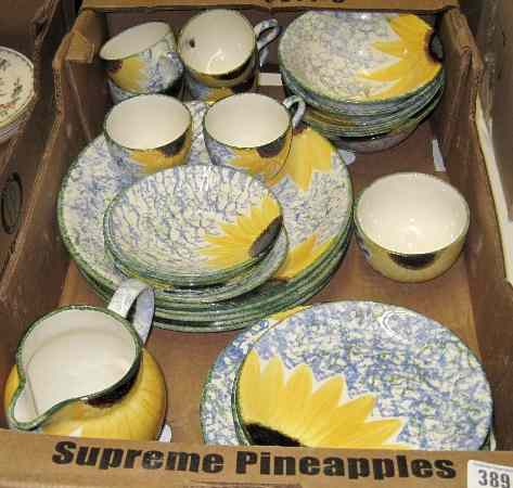 Appraisal: Poole Pottery Sunflower Dinner Service To Include Cups Saucers Cream