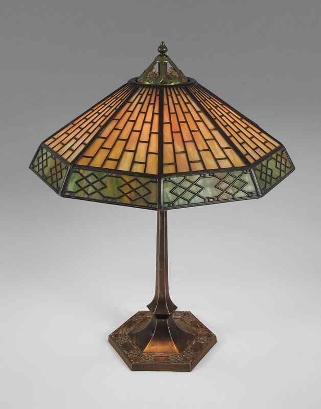 Appraisal: HANDEL LAMP Metal overlay shade over caramel and green slag