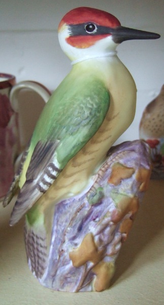 Appraisal: A Royal Worcester china figure of a woodpecker No cm