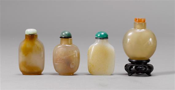 Appraisal: FOUR SNUFF BOTTLES THREE PALE AGATES AND ONE CELADON JADE