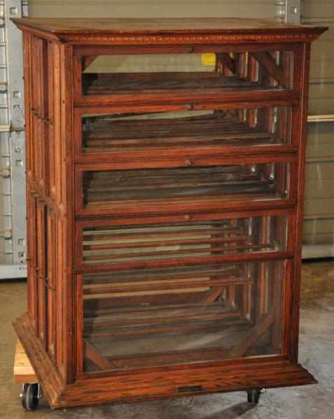 Appraisal: Walnut Ribbon Cabinet Condition Excellent Size x x