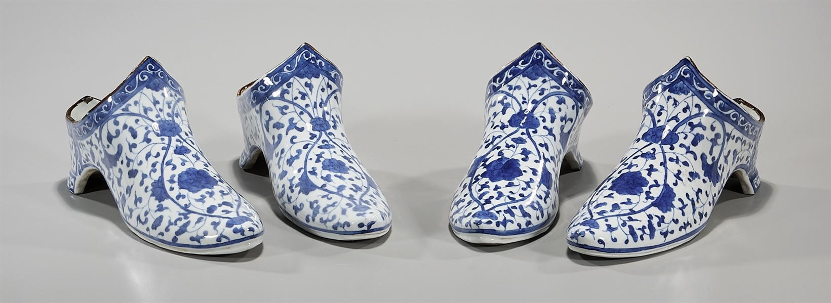 Appraisal: Two pairs of Chinese blue and white porcelain shoes floral