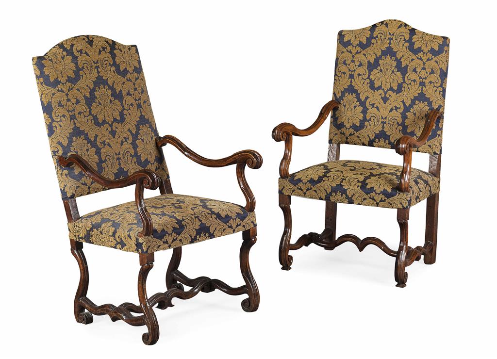 Appraisal: NEAR PAIR OF FLEMISH WALNUT AND UPHOLSTERED OPEN ARMCHAIRS TH