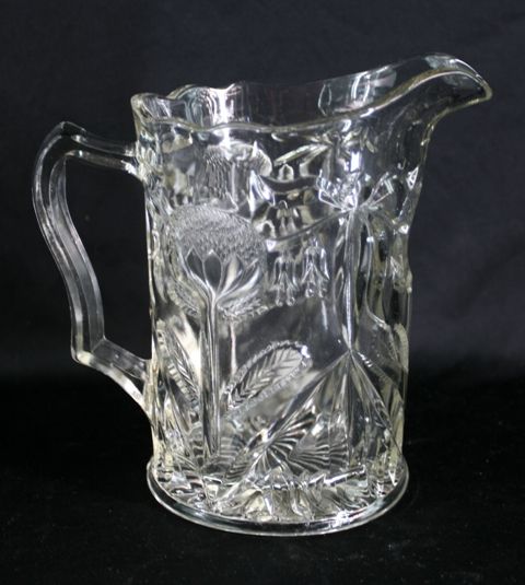 Appraisal: An Australian moulded glass jug circa with waratah decoration cm