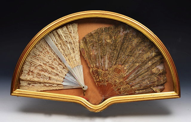 Appraisal: AN ANTIQUE CONTINENTAL FAN with applied beadwork decoration and gilded