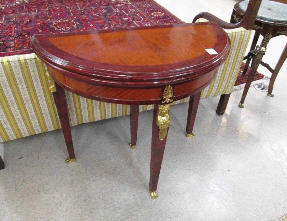 Appraisal: FRENCH EMPIRE STYLE MAHOGANY DEMILUNE GAME TABLE th century the