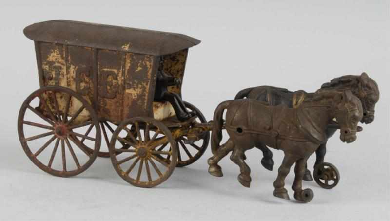 Appraisal: Cast Iron Horse-Drawn Ice Wagon Toy Description American Original driver