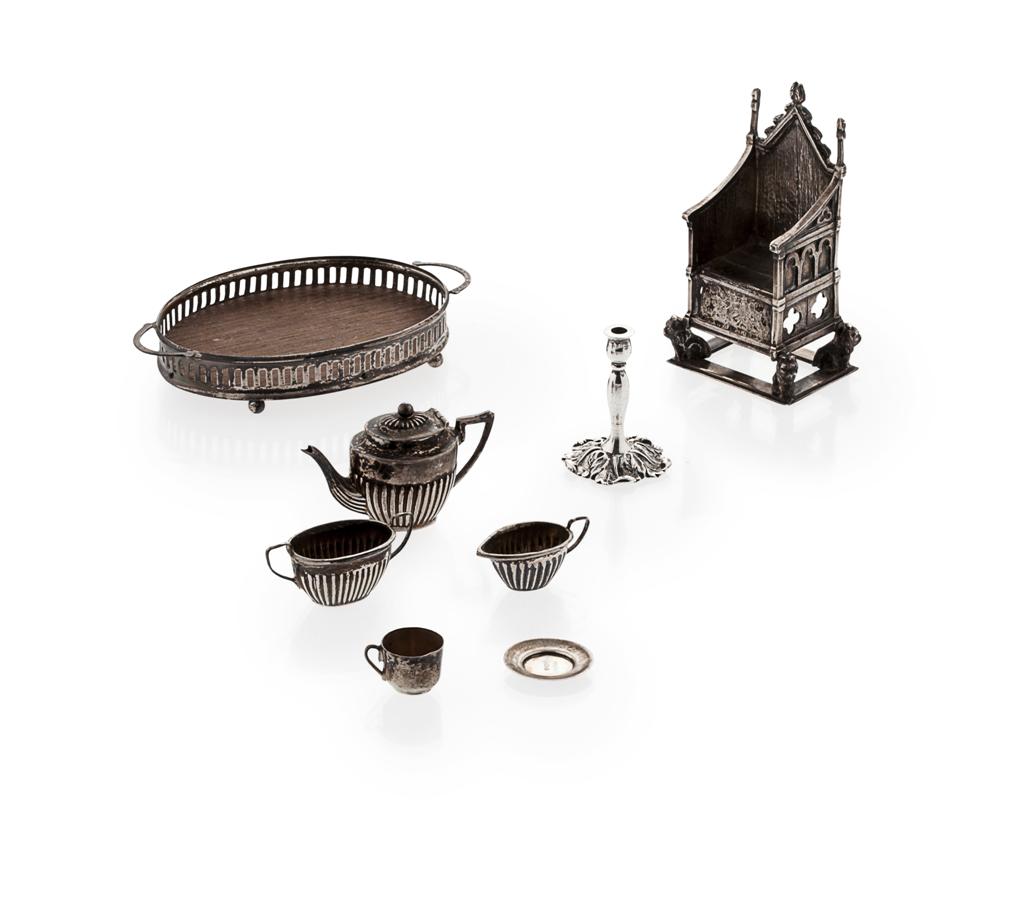 Appraisal: A group of miniature silver to include a tea and