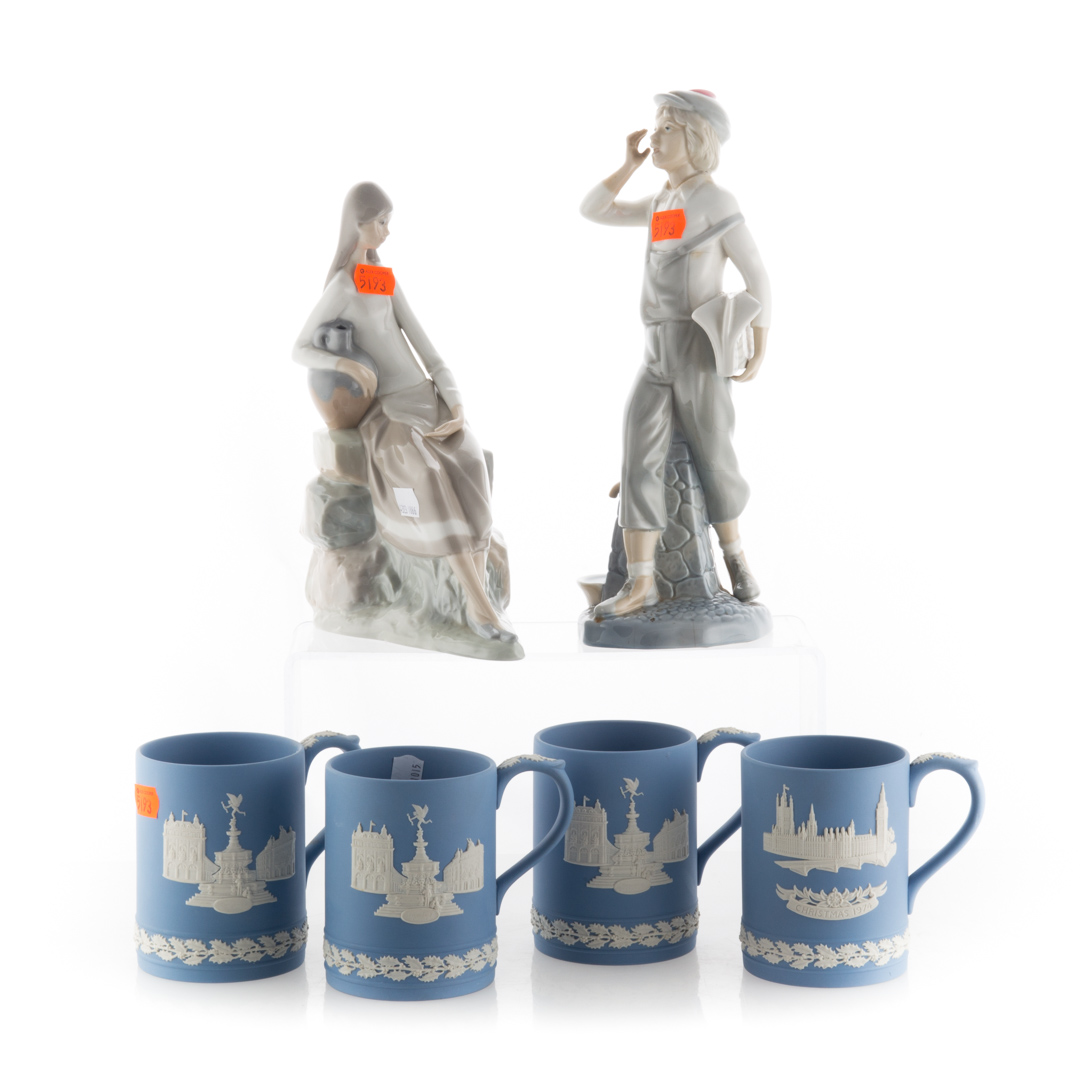 Appraisal: Two Lladro style figures and four Wedgwood cups Wedgwood blue