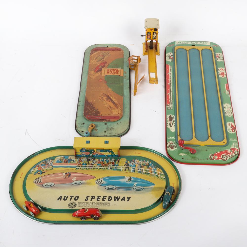 Appraisal: FOUR TIN LITHO AUTO RACING TOYS GAMES TRACKS AUTOMATIC TOY