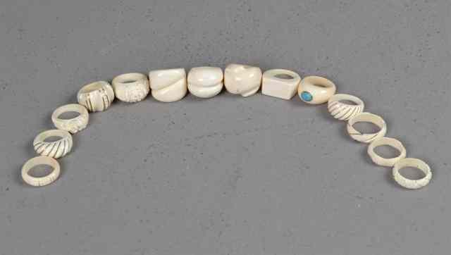 Appraisal: Chinese Carved Ivory RingsEach finely carved some simple designs some