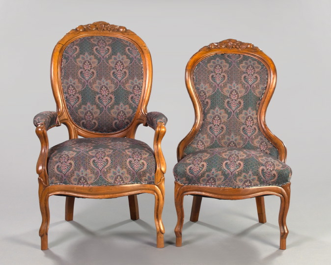 Appraisal: Pair of Rococo-Style Mahogany Chairs comprised of an armchair and