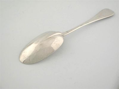 Appraisal: A Queen Anne wavy end spoon with a moulded rattail