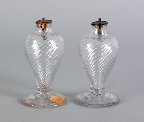 Appraisal: Pair of blown colorless glass sparking lamps th c in