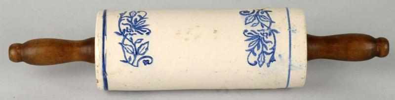 Appraisal: Pottery Decorated Rolling Pin Description Freehand blue and wooden handles