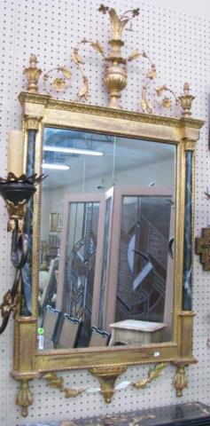 Appraisal: A French style decorator wall mirror carved and gesso urn