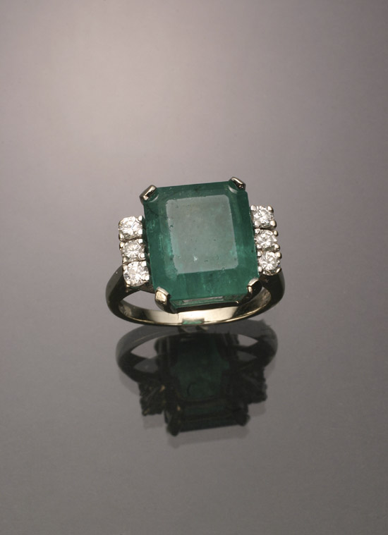 Appraisal: Tested -Karat White-Gold Emerald and Diamond Dinner Ring The four-prong