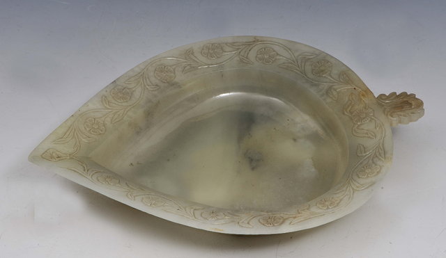 Appraisal: A MUGHAL JADE IN THE FORM OF A LEAF the