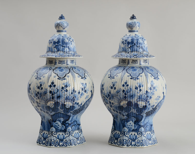 Appraisal: PAIR OF DELFT BLUE AND WHITE REEDED BALUSTER-FORM JARS AND