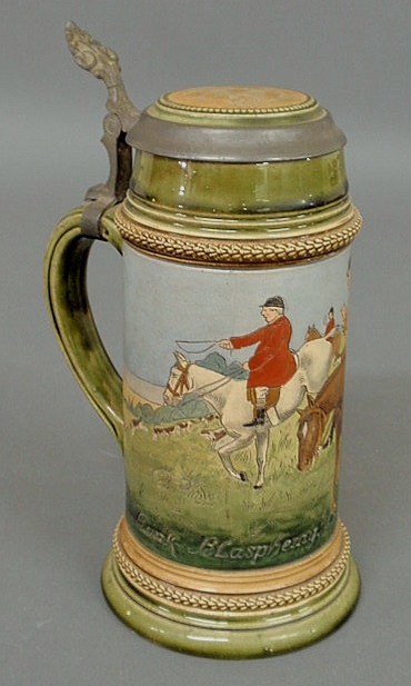 Appraisal: German ceramic stein decorated with a fox hunting scene titled